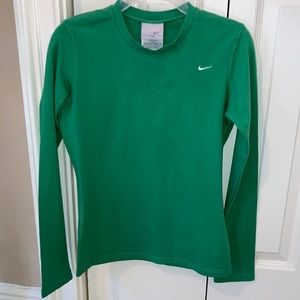 Women’s NIKE green cotton with spandex shirt.